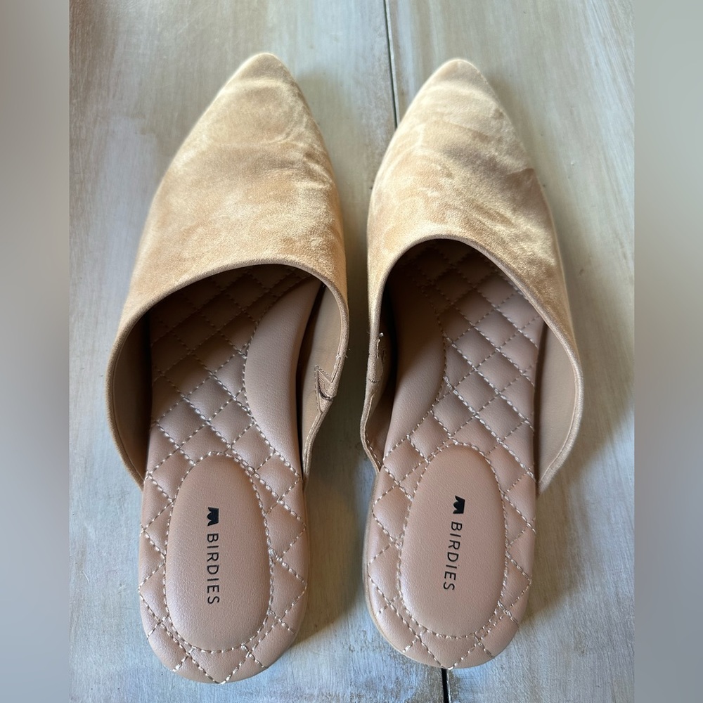 Birdies tan mules.